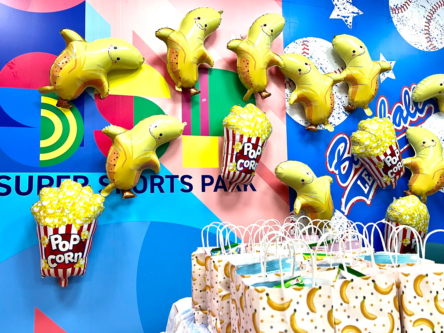 Balloons, party decorations and a gift table at an SSP birthday celebration